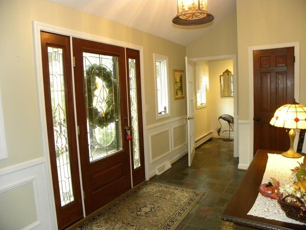 101 Vinton Road Holland, MA 01521 - Photo 31 of 42 a living room with furniture and a gate