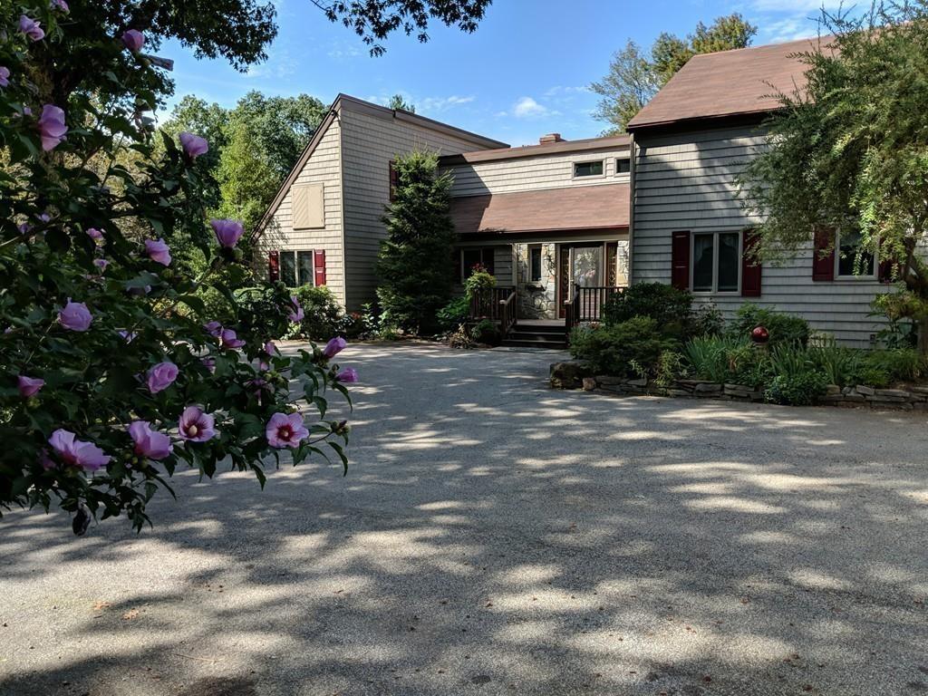 101 Vinton Road Holland, MA 01521 - Photo 34 of 42 a view of a house with a patio