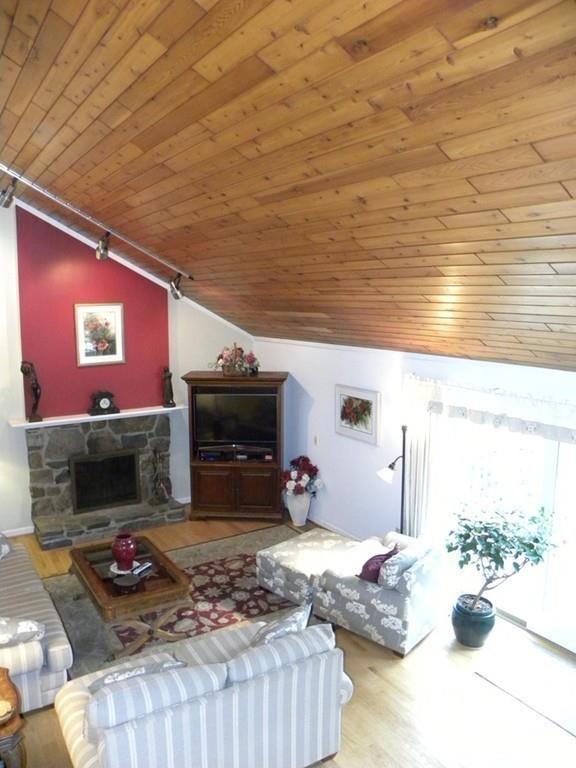 101 Vinton Road Holland, MA 01521 - Photo 7 of 42 a living room with furniture and a flat screen tv