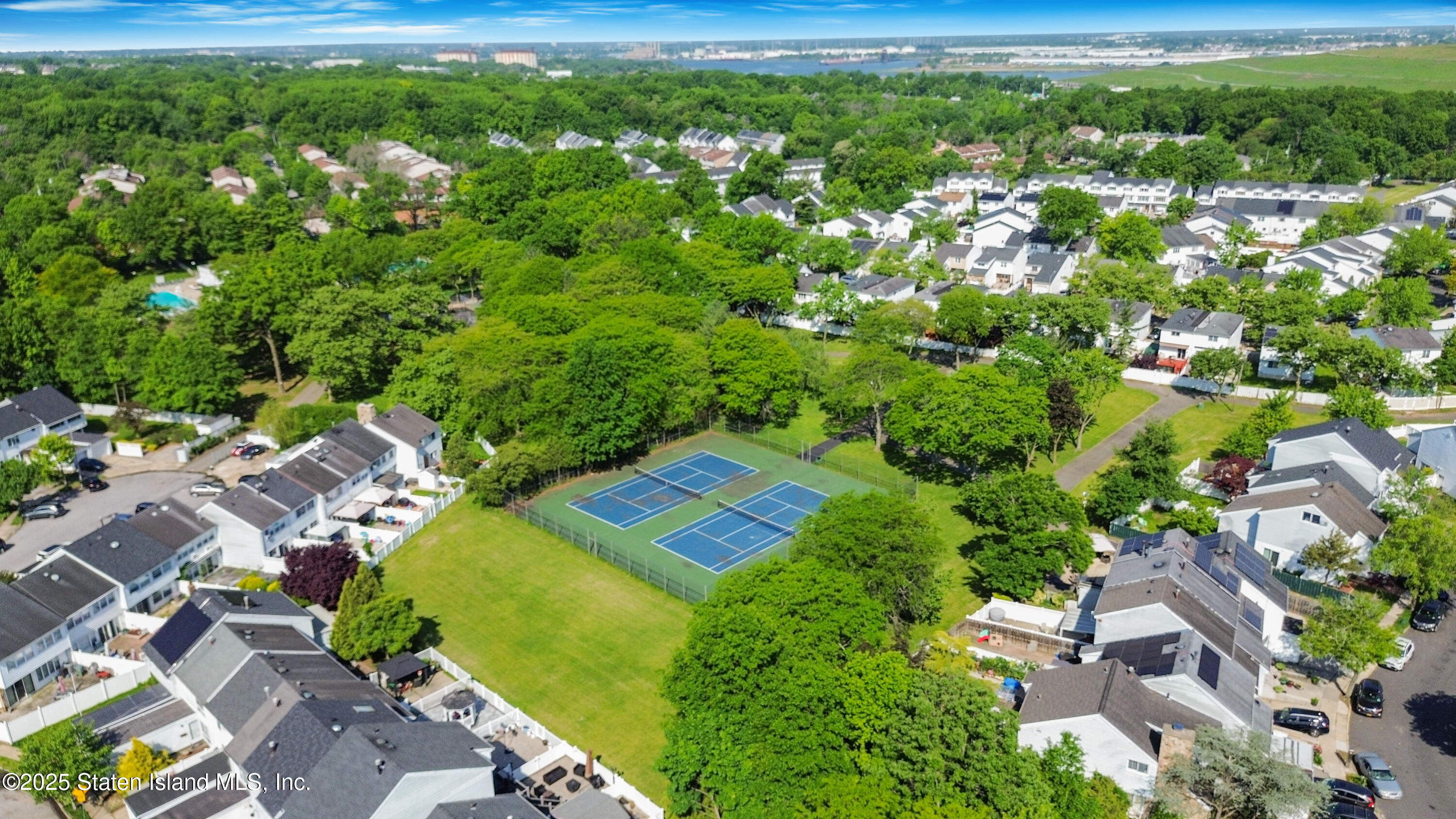 111 Hampton Green Staten Island, NY 10312 - Photo 15 of 19 an aerial view of residential houses with outdoor space and trees