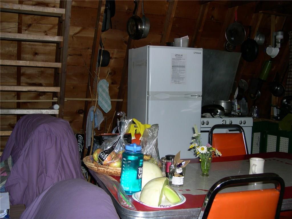 Lot 22 Alca Heights Road Oquossoc, ME 04964 - Photo 13 of 31 stairs to 2nd floor bunk room, kitchen