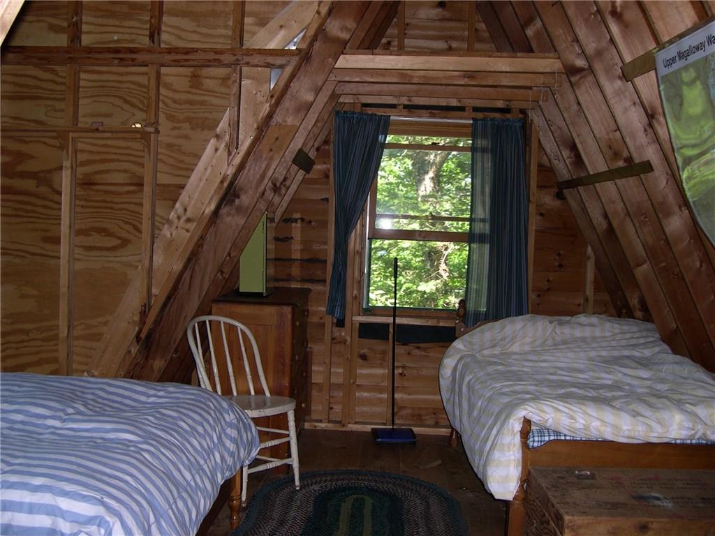 Lot 22 Alca Heights Road Oquossoc, ME 04964 - Photo 16 of 31 2nd floor bunk room