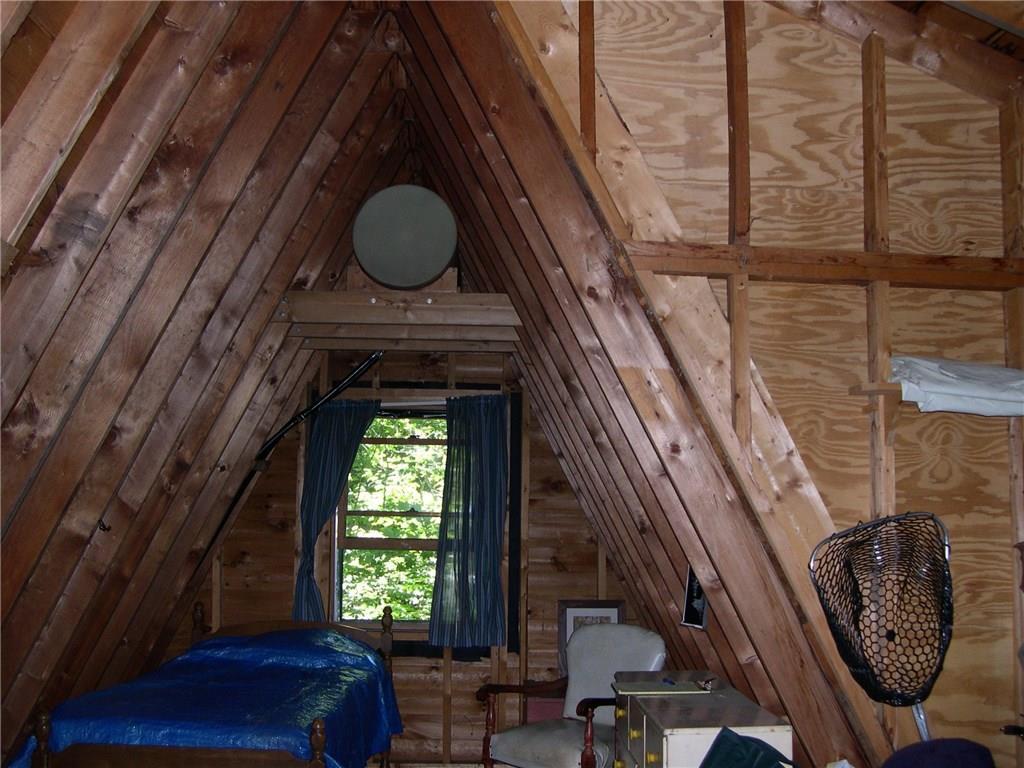 Lot 22 Alca Heights Road Oquossoc, ME 04964 - Photo 20 of 31 bunk room, lake water storage tank above