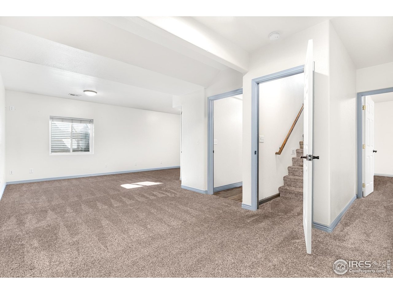 3418 Windmill Court Evans, CO 80620 - Photo 14 of 31 a view of an empty room with a window