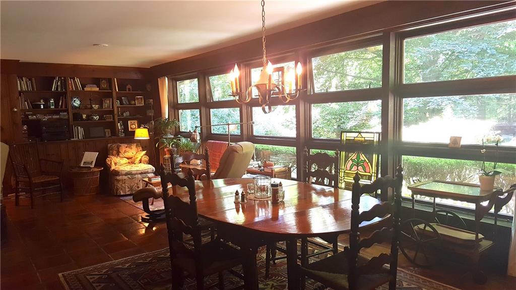 28 Newgate Road Pittsburgh, PA 15202 - Photo 13 of 24 Dining area surrounded by detailed built in shelving.