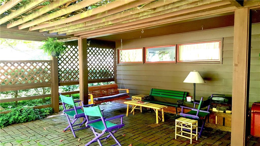 28 Newgate Road Pittsburgh, PA 15202 - Photo 3 of 24 Relaxing front patio and pergola, complete with porch swing!