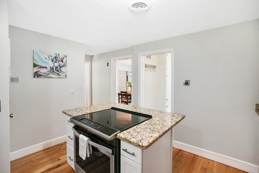 38 Fallston Street Springfield, MA 01119 - Photo 12 of 35 a kitchen that has a sink and a stove in it