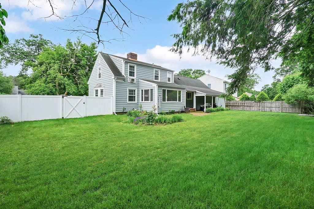 38 Fallston Street Springfield, MA 01119 - Photo 31 of 35 a front view of a house with a garden