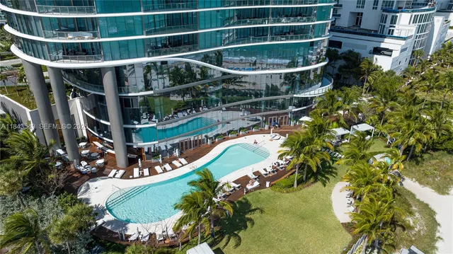 a swimming pool with a yard