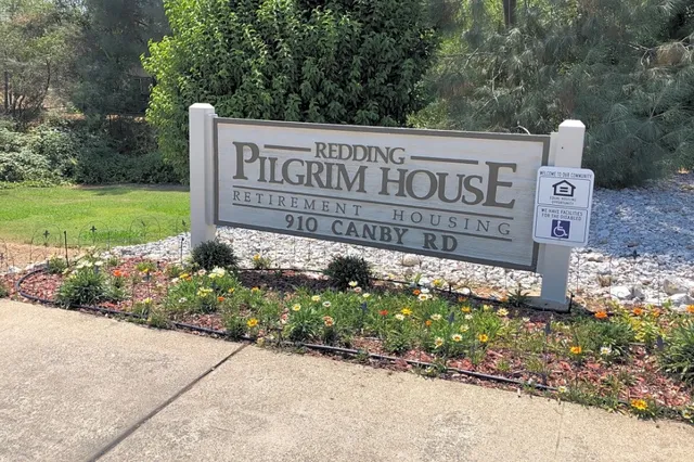 a sign on the side of a road