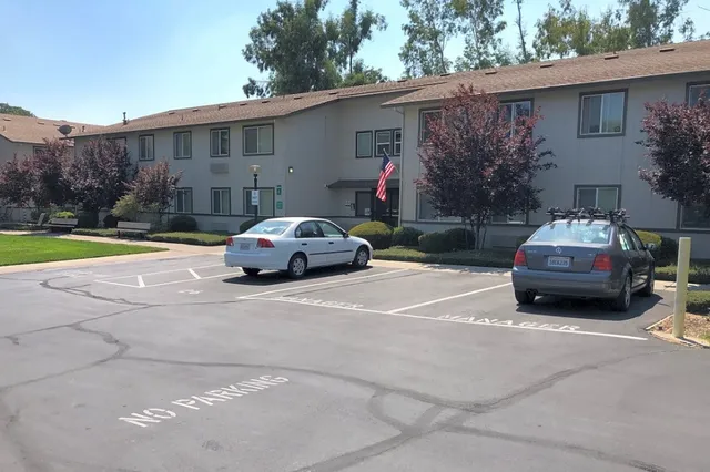 a car parked in front of a house