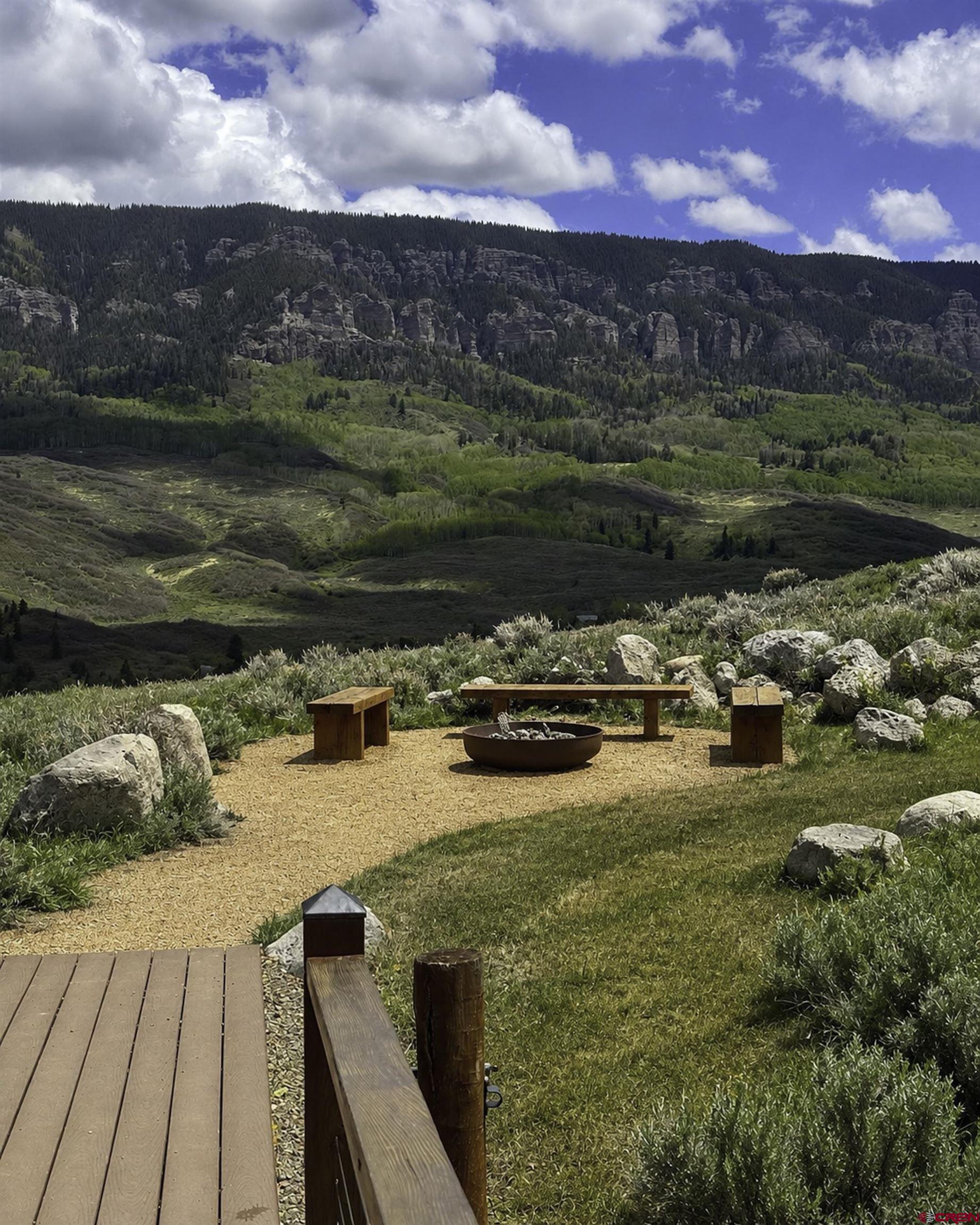 684 Falcon Way Montrose, CO 81403 - Photo 36 of 43 a view of a lake with outdoor space