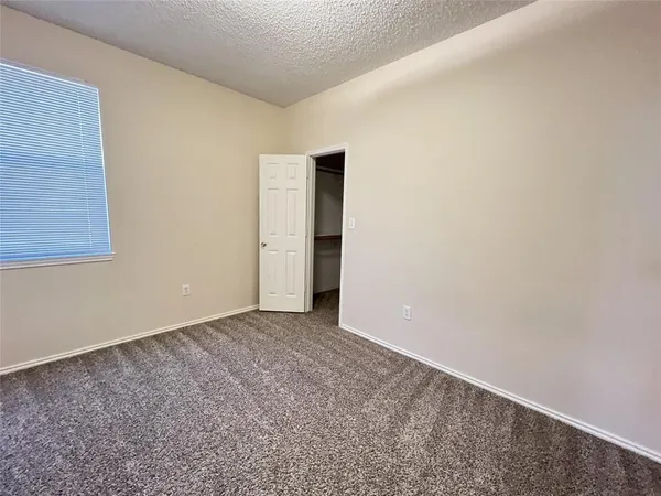 an empty room with closet