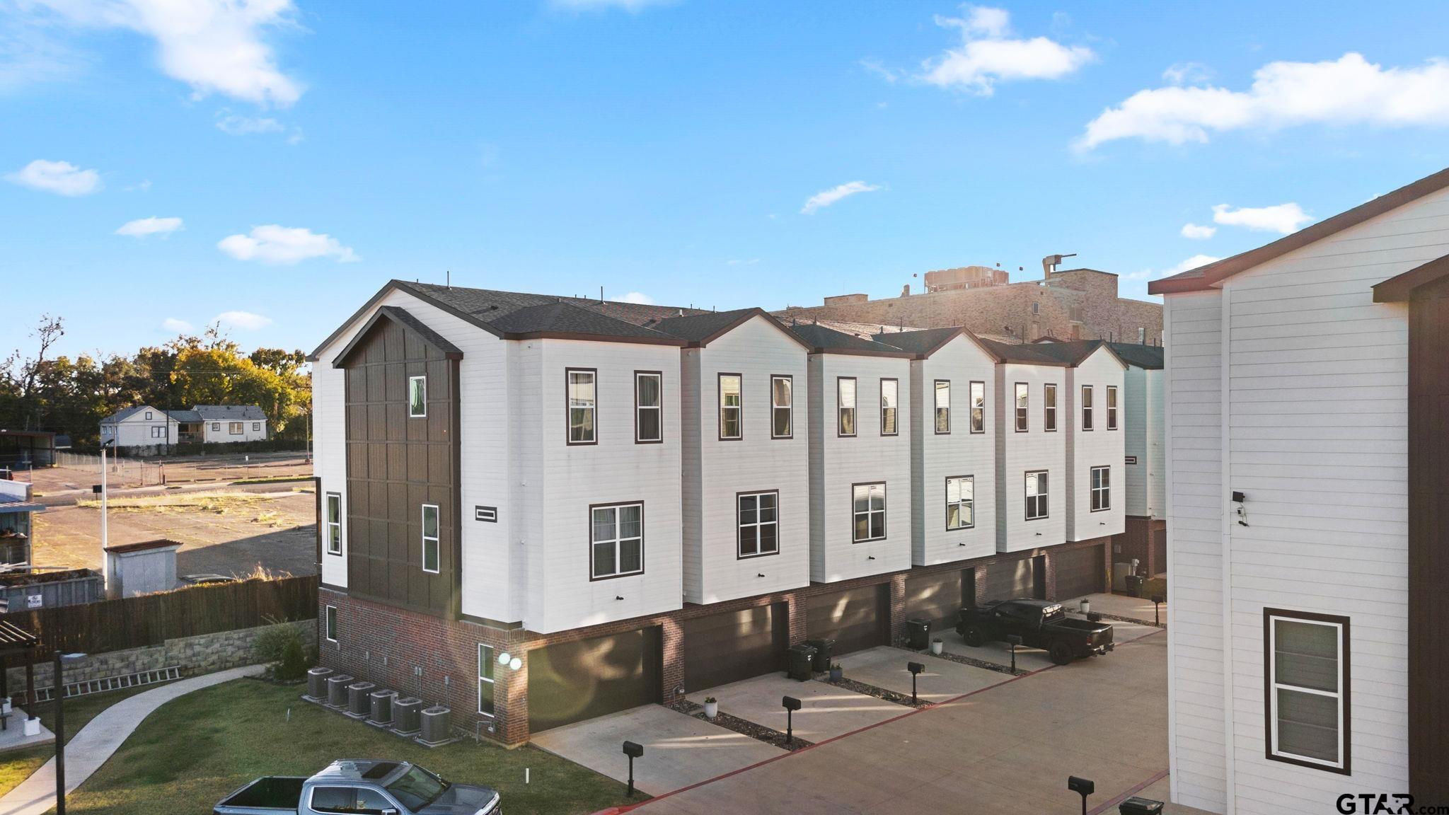 546 West Erwin Street Tyler, TX 75702 - Photo 25 of 31 a view of a house with a wooden fence