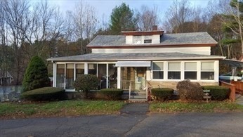 205 Hardwick Road Hardwick, MA 01031 - Photo 2 of 29 a front view of a house with garden and porch