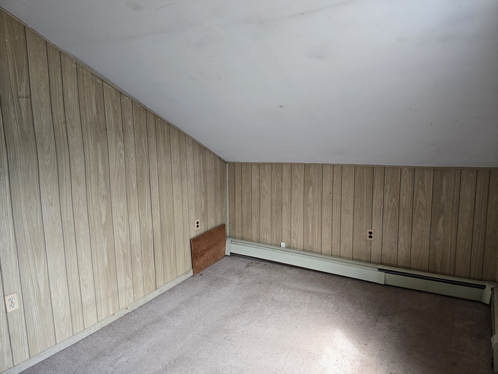 205 Hardwick Road Hardwick, MA 01031 - Photo 22 of 29 an empty room with a wooden walls