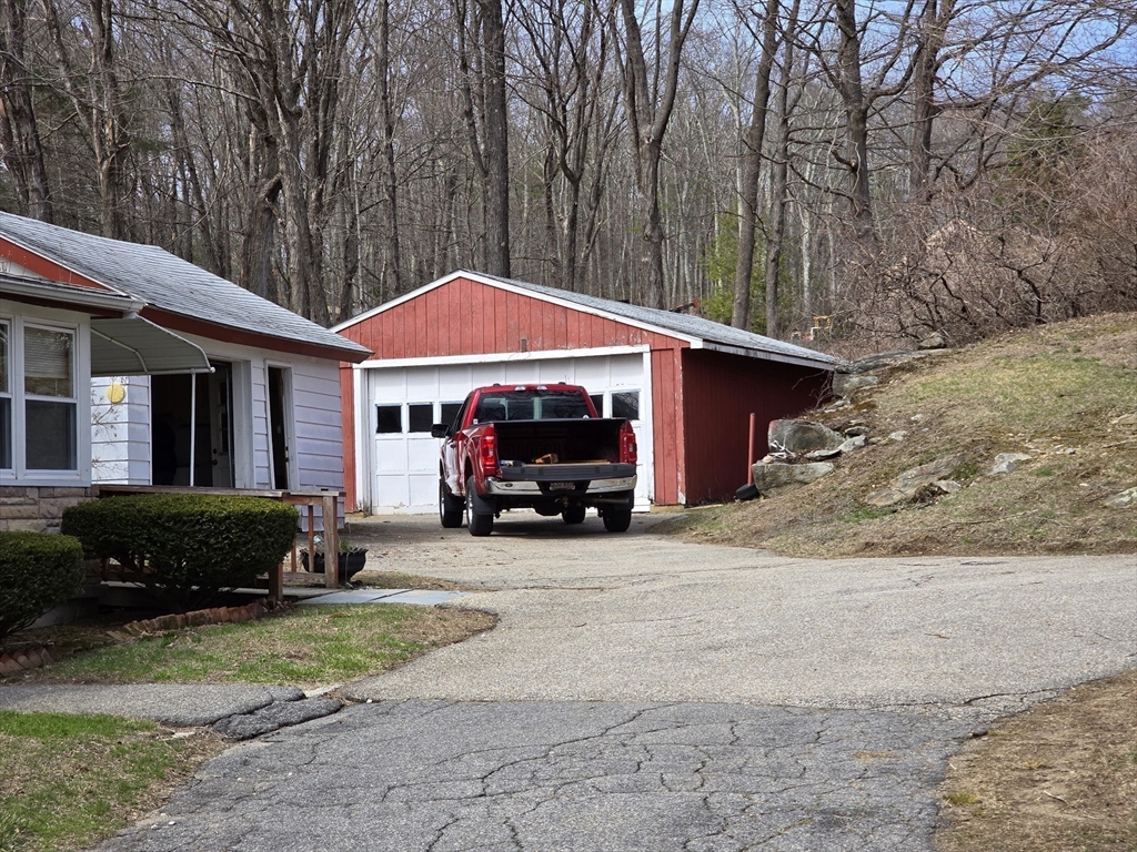 205 Hardwick Road Hardwick, MA 01031 - Photo 8 of 29 a view of a house with a patio