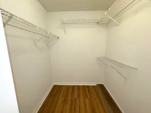 a view of a room with racks on the wall