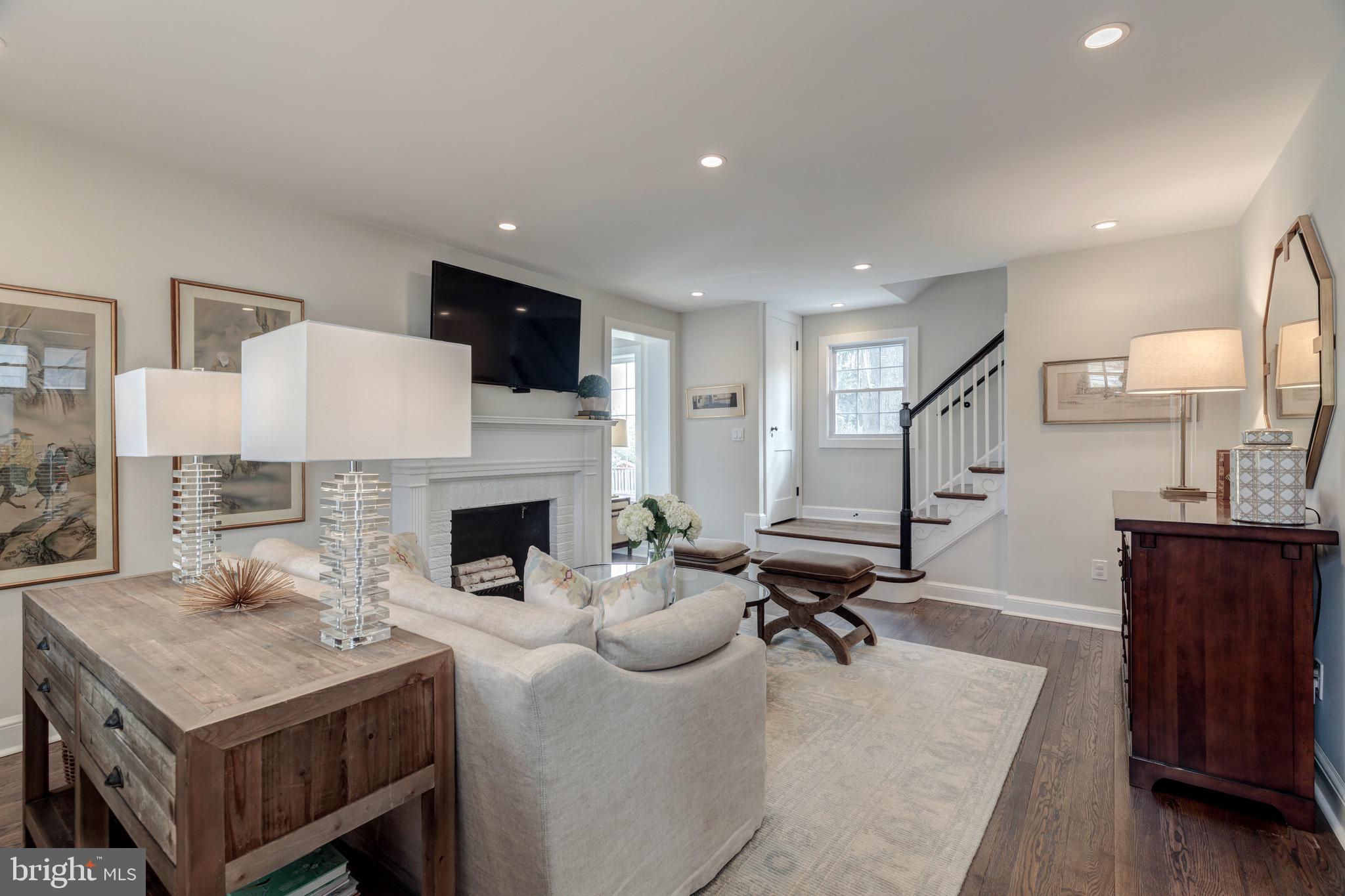 702 Dartmouth Avenue Silver Spring, MD 20910 - Photo 2 of 19 Charming Family Room with Fireplace & Tall Windows