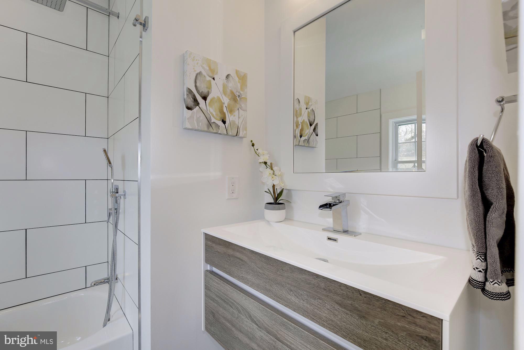 702 Dartmouth Avenue Silver Spring, MD 20910 - Photo 11 of 19 Newly Updated Upper Level Bathroom