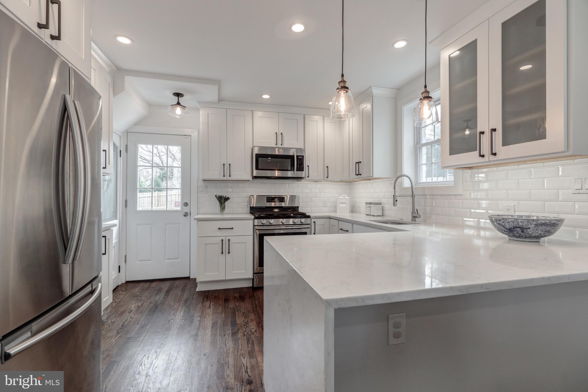 702 Dartmouth Avenue Silver Spring, MD 20910 - Photo 4 of 19 Gourmet Kitchen with Bar Seating
