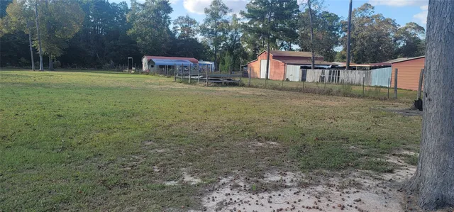 a house view with a outdoor space