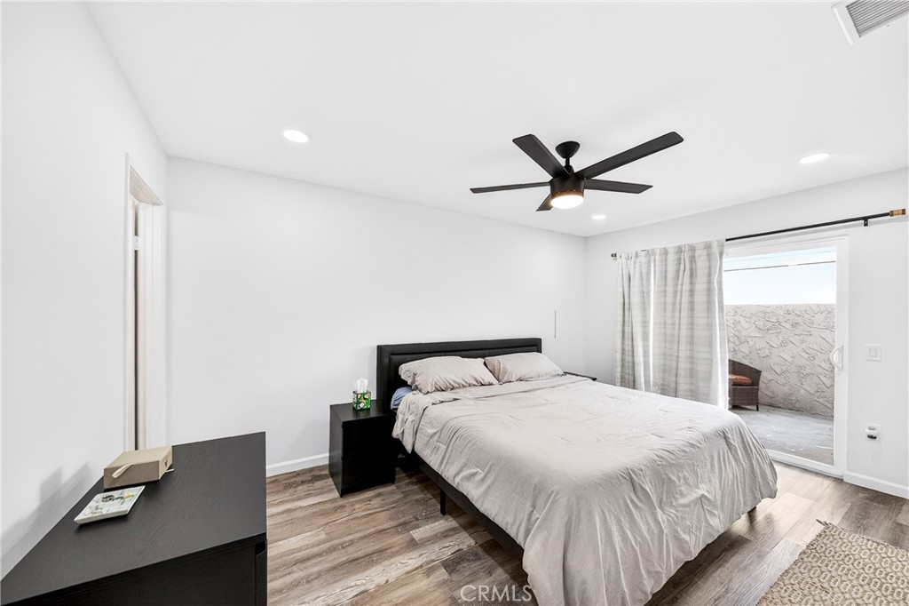 5050 Brooklawn Place Riverside, CA 92504 - Photo 20 of 44 a bedroom with a bed and window