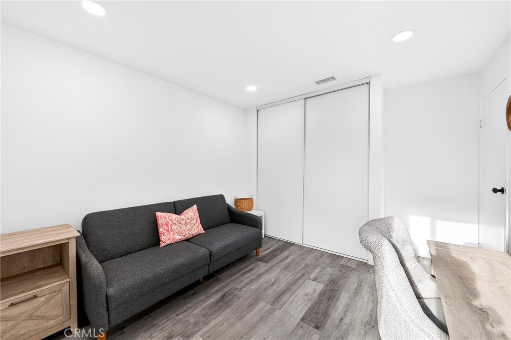 5050 Brooklawn Place Riverside, CA 92504 - Photo 27 of 44 a living room with furniture