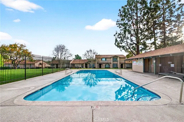 a view of swimming pool with outdoor seating