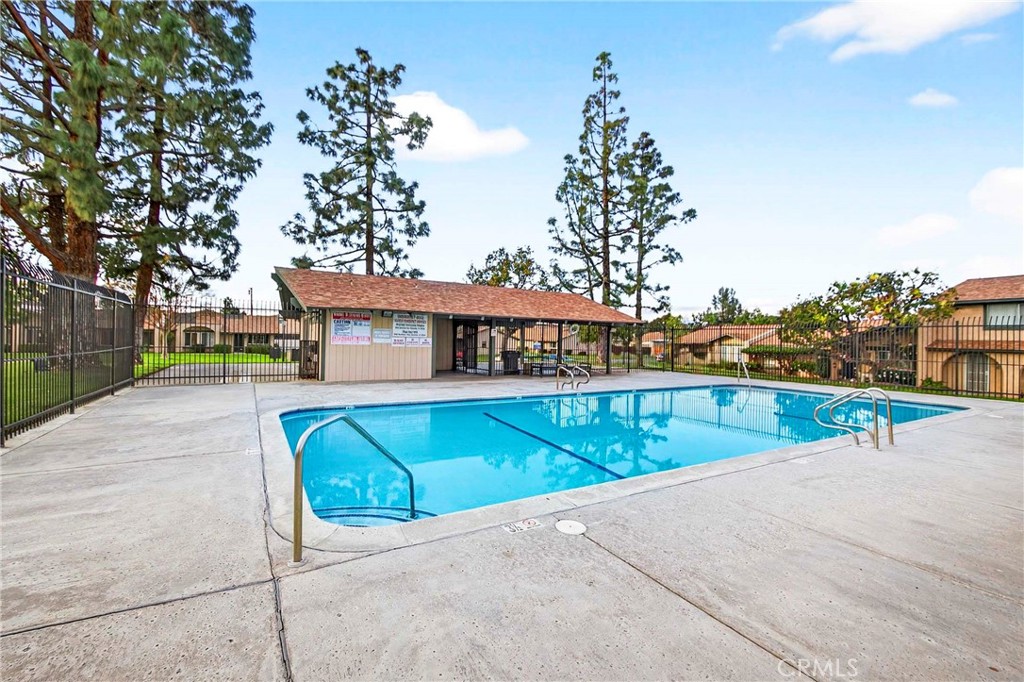5050 Brooklawn Place Riverside, CA 92504 - Photo 42 of 44 swimming pool view with a outdoor space