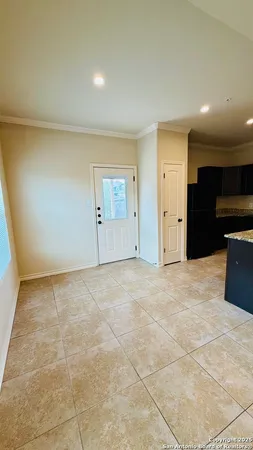 a kitchen with stainless steel appliances granite countertop a refrigerator and sink