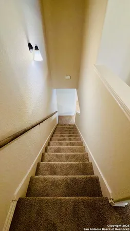 an empty room with a empty space and windows