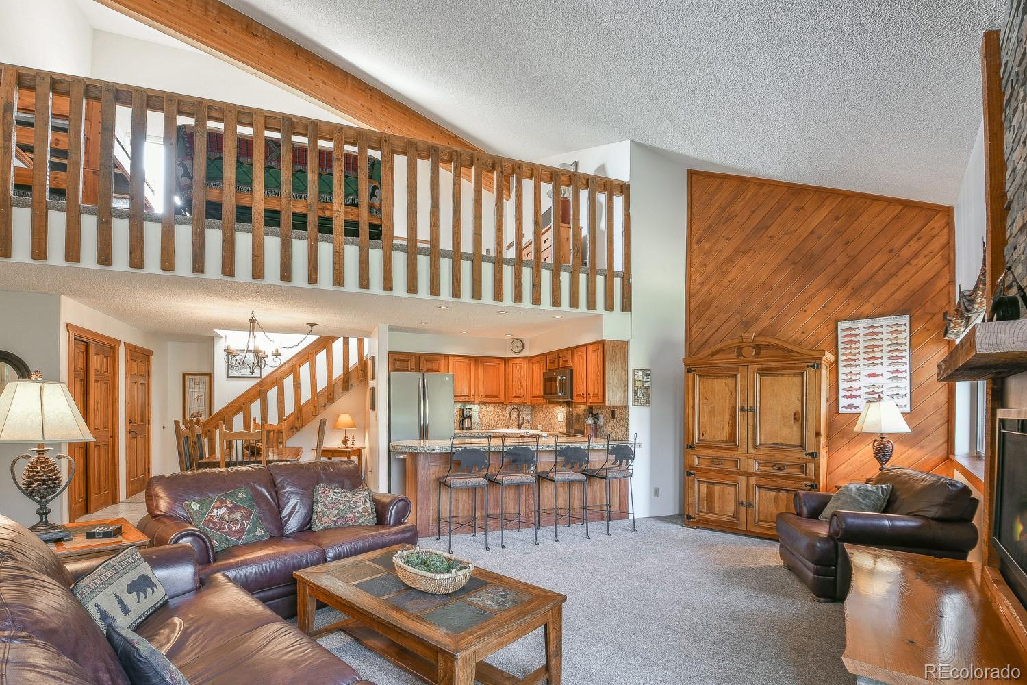 400 4 O Clock Road, Unit E Breckenridge, CO 80424 - Photo 15 of 34 a living room with furniture