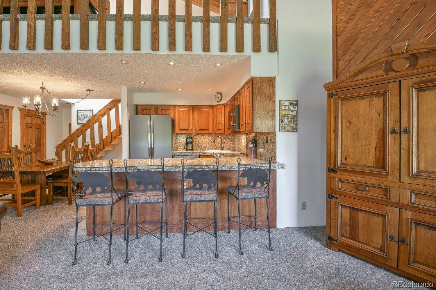 400 4 O Clock Road, Unit E Breckenridge, CO 80424 - Photo 16 of 34 a dining room with furniture