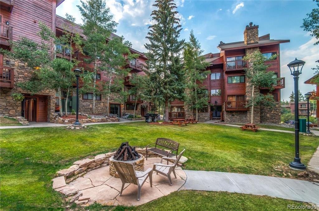 400 4 O Clock Road, Unit E Breckenridge, CO 80424 - Photo 9 of 34 a view of a house with a yard porch and sitting area