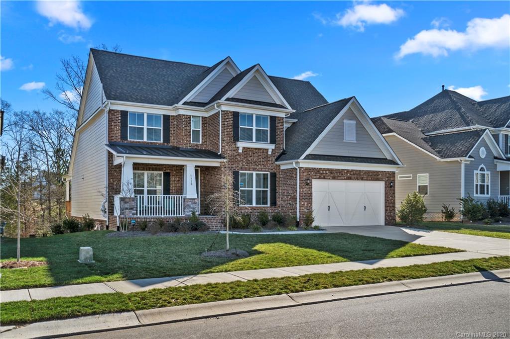 5318 Meadowcroft Way Fort Mill, SC 29708 - Photo 1 of 48 a front view of a house with a yard