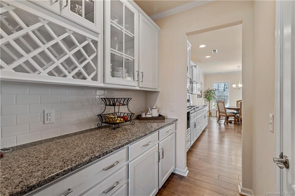 5318 Meadowcroft Way Fort Mill, SC 29708 - Photo 14 of 48 a kitchen with granite countertop a sink and cabinets