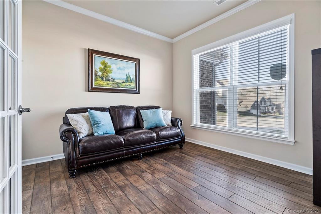 5318 Meadowcroft Way Fort Mill, SC 29708 - Photo 3 of 48 a living room with furniture and a window