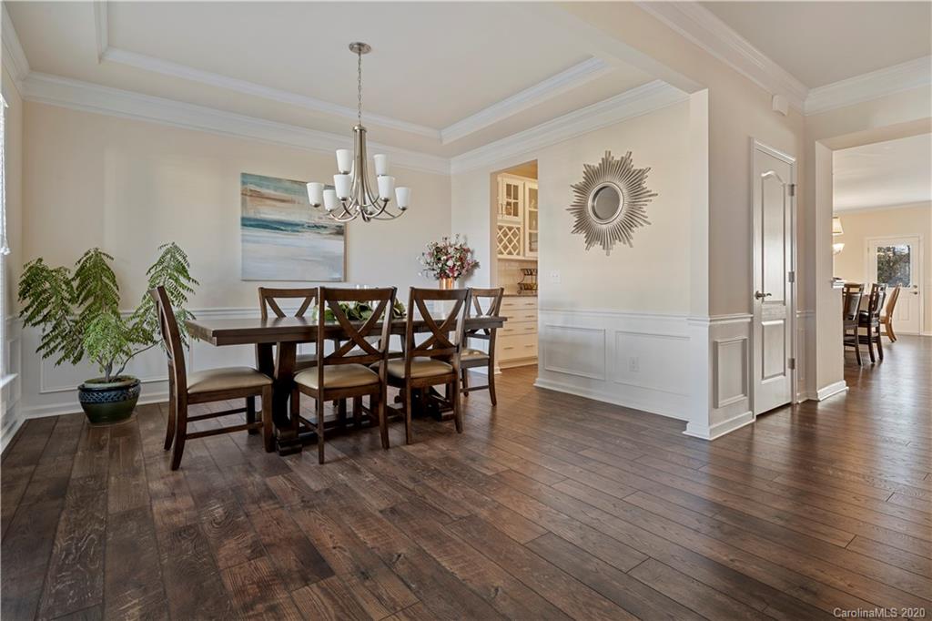 5318 Meadowcroft Way Fort Mill, SC 29708 - Photo 4 of 48 a view of a dining room with furniture window and wooden floor