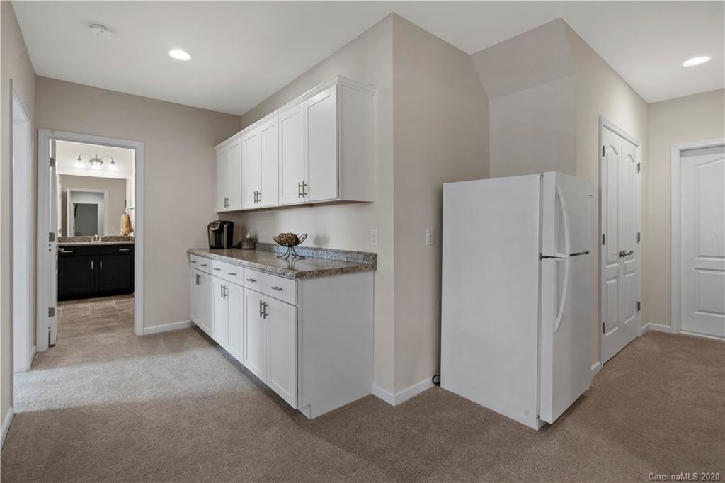 5318 Meadowcroft Way Fort Mill, SC 29708 - Photo 31 of 48 a kitchen with refrigerator and cabinets