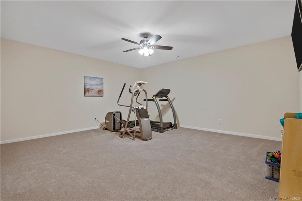 5318 Meadowcroft Way Fort Mill, SC 29708 - Photo 33 of 48 a view of a room with gym equipment