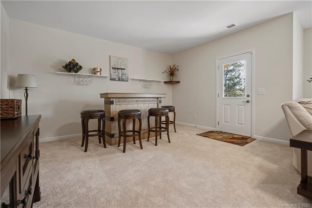 5318 Meadowcroft Way Fort Mill, SC 29708 - Photo 36 of 48 a dining room with furniture and a window
