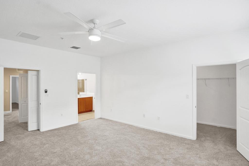 608 Southwest 3rd Avenue Pompano Beach, FL 33060 - Photo 21 of 64 an empty room with closet and a ceiling fan