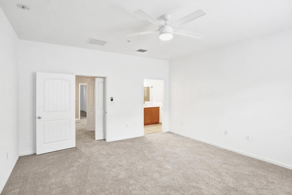 608 Southwest 3rd Avenue Pompano Beach, FL 33060 - Photo 22 of 64 an empty room with an entryway and fan