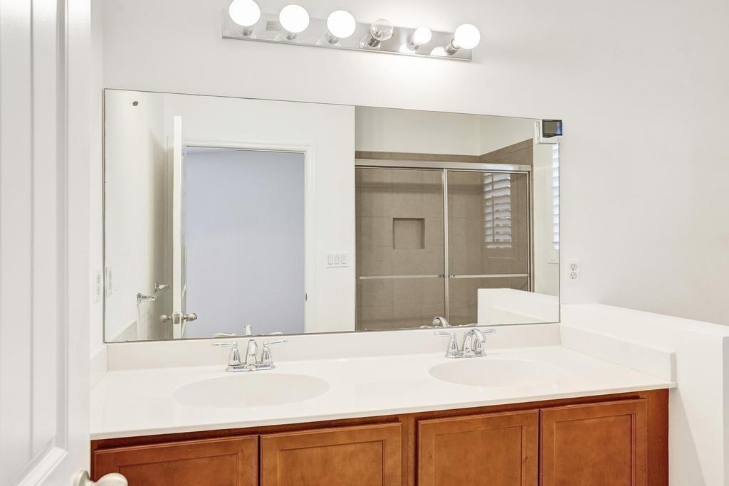 608 Southwest 3rd Avenue Pompano Beach, FL 33060 - Photo 24 of 64 a bathroom with a sink and a mirror