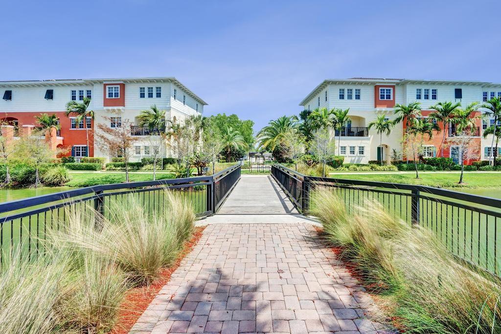 608 Southwest 3rd Avenue Pompano Beach, FL 33060 - Photo 54 of 64 a view of a brick building next to a lake