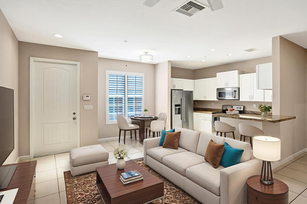 608 Southwest 3rd Avenue Pompano Beach, FL 33060 - Photo 6 of 64 a living room with furniture and a table