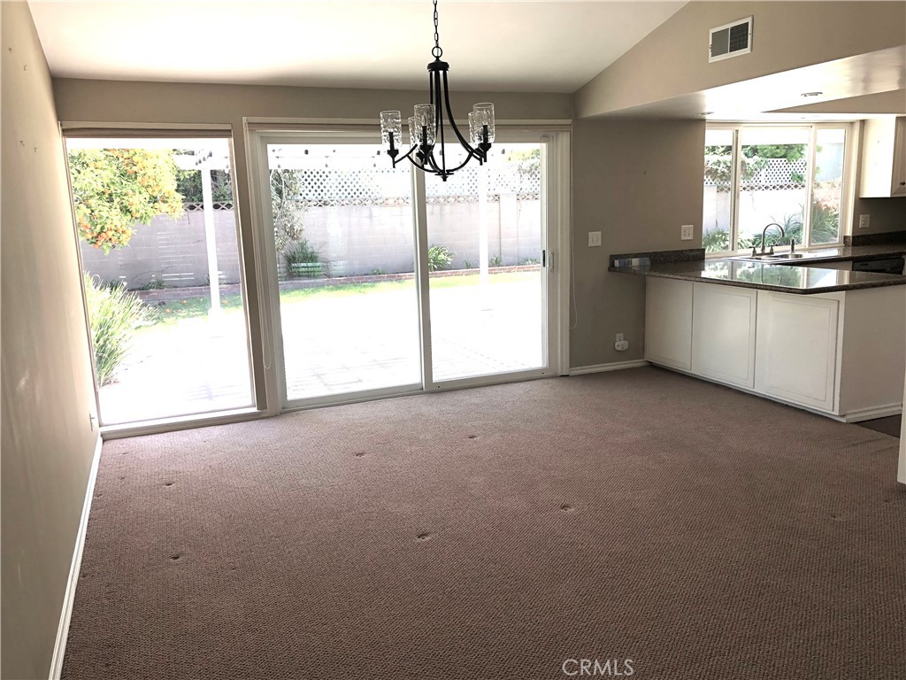11402 Donovan Road Los Alamitos, CA 90720 - Photo 12 of 44 a view of an empty room with a window