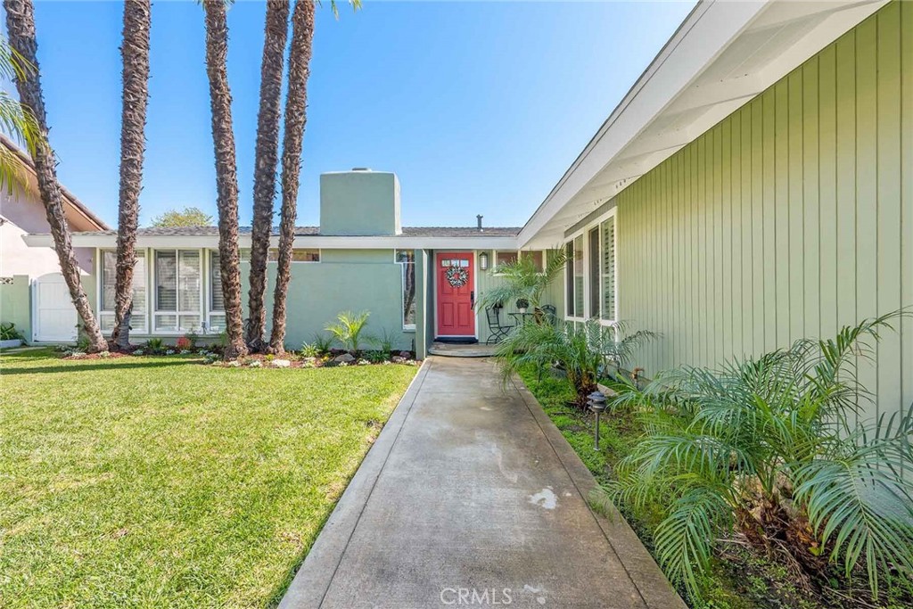 11402 Donovan Road Los Alamitos, CA 90720 - Photo 2 of 44 a front view of a house with garden