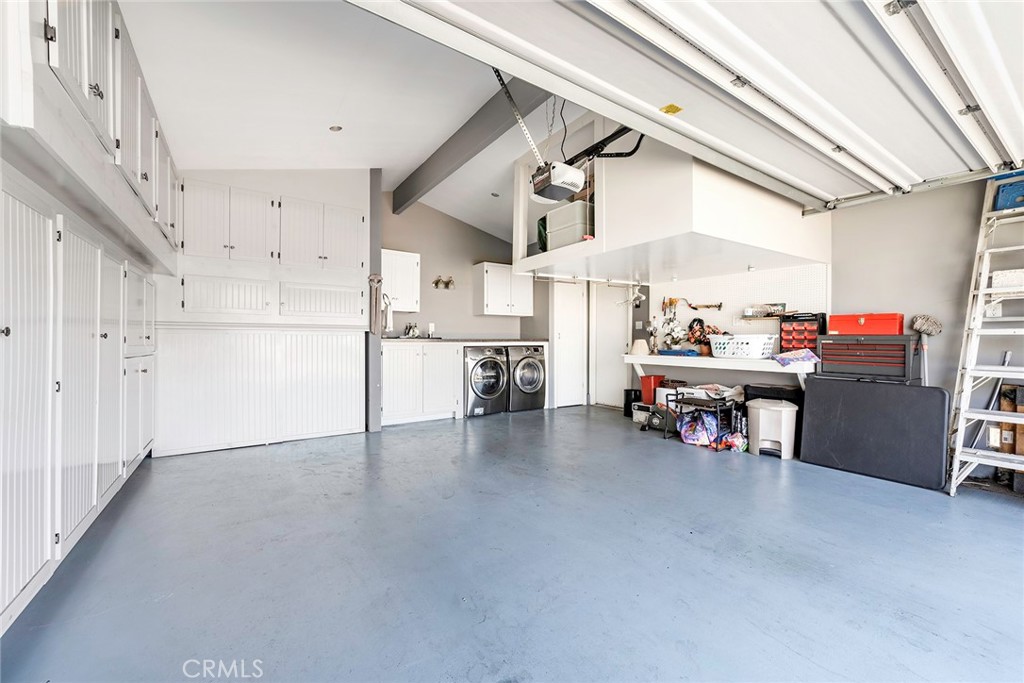 11402 Donovan Road Los Alamitos, CA 90720 - Photo 21 of 44 a view of a livingroom with furniture and a flat screen tv